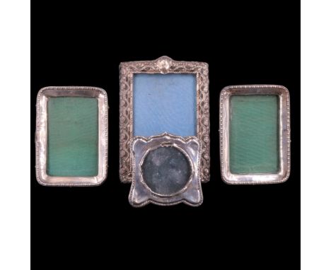 Four late 19th / early 20th Century silver photograph frames, largest 12 cm