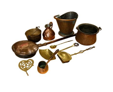 A large group of antique and vintage domestic metalware including a Georgian bed warming pan, a copper coal helmet, a brass j