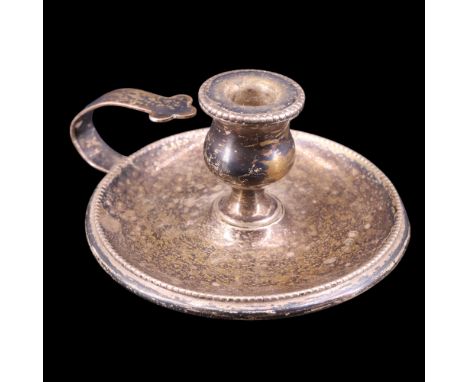 An Edwardian silver taperstick, 6.5 cm excluding handle, 35 g 