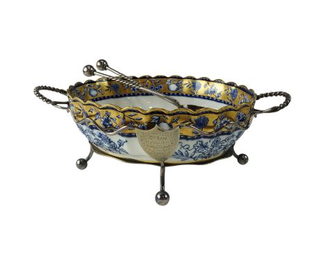 A Spode gilt-enriched blue-and-white transfer-printed salad bowl, electroplate stand and servers