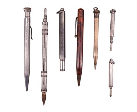 A group of vintage propelling pencils together with a combination propelling pencil and dip pen