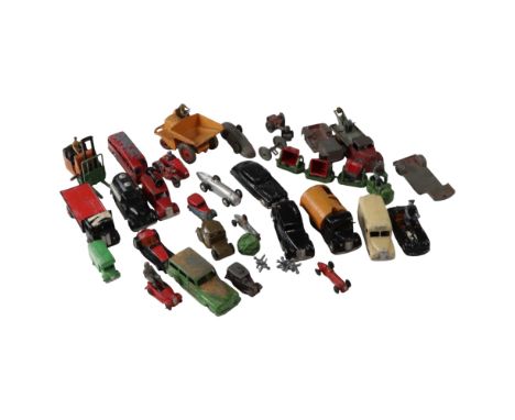 A group of vintage Corgi, Dinky and other diecast toy cars including a Muir-Hill Dumper, a Bedford, a GUY and a Coventry Clim