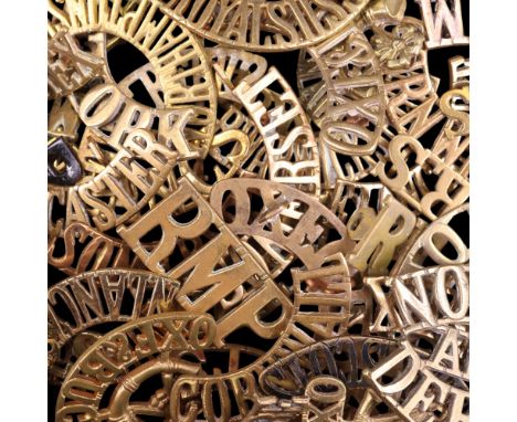 A group of British Army metal shoulder titles 