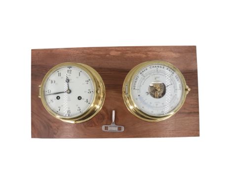 A Shatz marine bulkhead clock and aneroid barometer pair, each 17.5 cm 