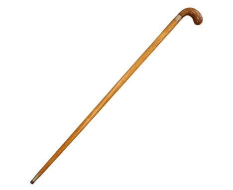 A Victorian silver collared walking stick, the ferrule engraved "Bro. Aaron, from George, 1890", height 87 cm