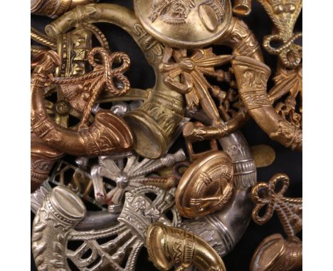 A group of Durham Light Infantry and Kings Shropshire Light Infantry cap and collar badges etc