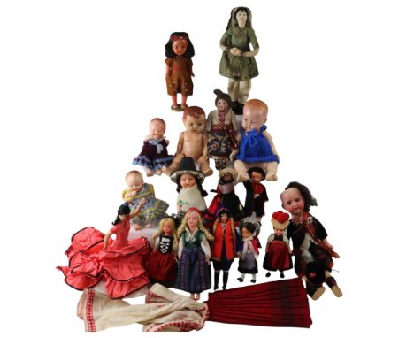 A group of vintage national dress dolls together with sundry other dolls, including bisque, cloth and composition examples