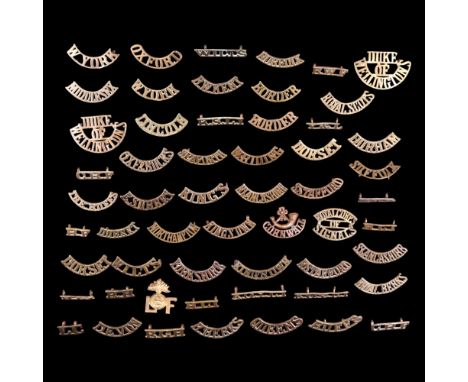 A group of British Army metal shoulder titles