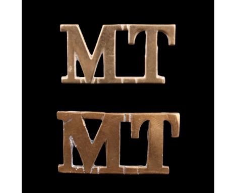 Two British Army Motor Transport Corps brass shoulder titles