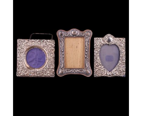 Three late 19th / early 20th Century silver photograph frames, largest 13 cm x 9 cm