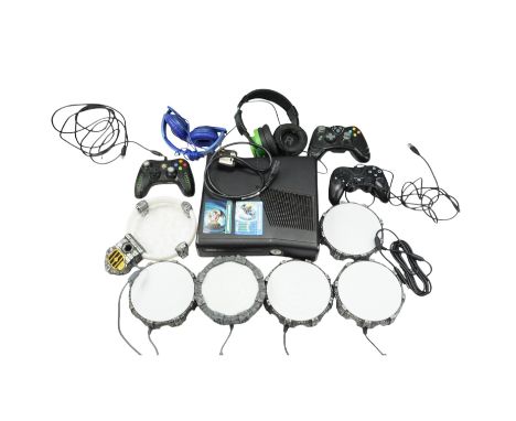 An XBOX 360 video game console together with controllers, Activision Skylanders Portal of Power pads, power cable, etc