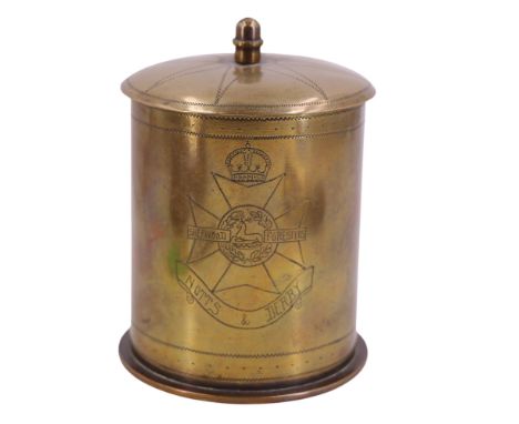 A Great War trench art tobacco jar or tea caddy, fabricated from a 1917 Belgian brass artillery shell case and engraved "CSM 