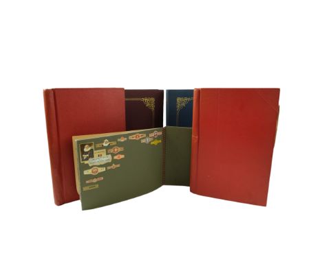 A collection of vintage beer bottle labels in four albums, together with a cigar band album