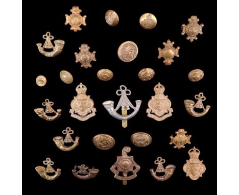 A group of Royal Sussex Regiment, Sussex Yeomanry and Oxfordshire and Buckinghamshire Light Infantry caps and collar badges e