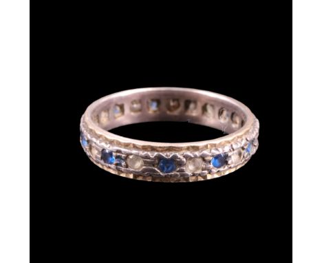 A vintage blue and white stone, 9 ct yellow metal and Sterling white metal band / eternity ring, circa mid-20th Century, P, 2