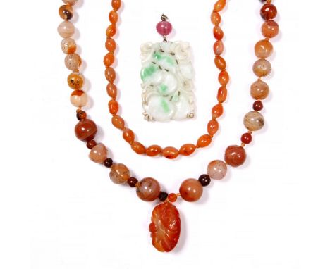 A Chinese agate necklace with carved pendant, an agate bracelet and a jade carved pendant (3)