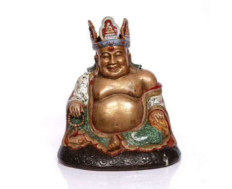 A Chinese Canton seated Put-tai late 19th Century with gilded body wearing a crown and seated on an oval chased cushion, 31cm
