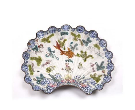 A large Canton enamel scalloped shaped dish 18th Century painted with aquatic scenes to each side 49cm x 33cm