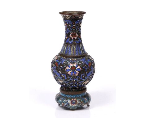 A Chinese cloisonne and enamel vase 19th Century with palmette and foliate designs, 16.5cm