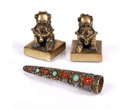 A Chinese silver gilt filigree finger nail protector 18th/19th Century decorated with seven florets formed by coral and turqu