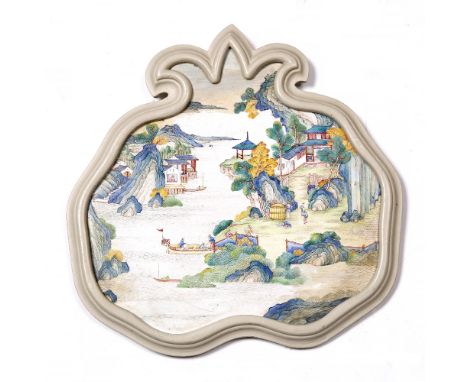 A fleur de lis style Chinese Canton enamel plaque 18th Century decorated with a coastal inlet dividing two rocky landscapes a