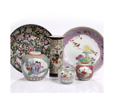 A Chinese shallow dish Republic period or later depicting birds on a branch with flowering peony within a pink ground enamel 