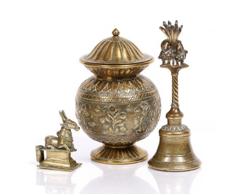 An Indian brass vase and cover late 19th Century embossed palmettes to the lid and rim with flower band 21cm, an Indian brass