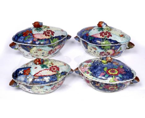 A pair of Chinese famille rose 'tobacco-leaf' oval tureen and covers Qianlong (1736-1795) with undulating rims, flanked on ei