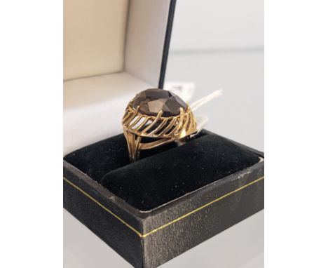9ct yellow gold ladies ring set with a large smokey quartz stone. [Ring size K] [5.85Grams] 