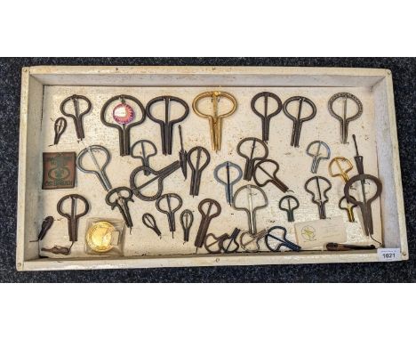 A Collection of framed antique and vintage jaw harps. Various sizes and ages. 