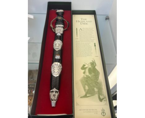 The Highland Dirk- comes with original box. Blade Produced by J. Nowell &amp; Sons Sheffield. Has a fork and knife utensil at