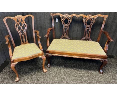 Chippendale style two seat parlour sofa together with matching single arm chair. Ornate splat backs, supported on ball and cl