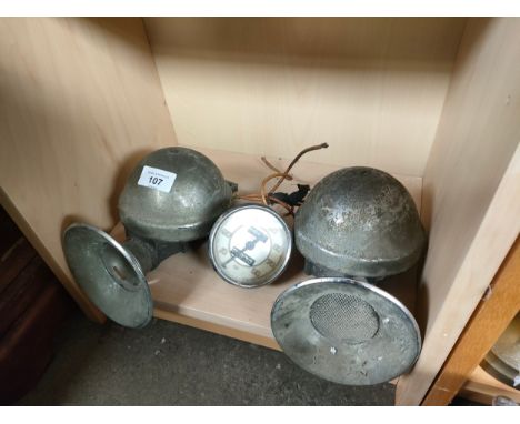Two vintage car horns together with vintage Smiths car speedometer 