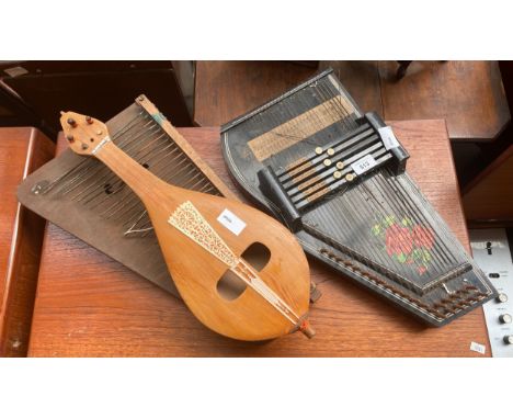 A Selection of musical instruments includes antique zither 