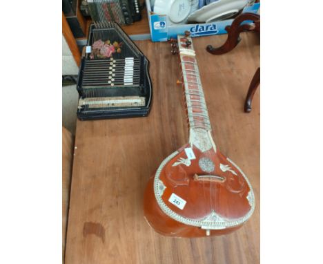 Sitar by Singh muscal instrument [as found] along with a Antique Zither instrument 