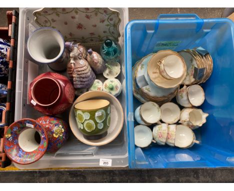 A box of collectables to include Sylvac vase and Scottish Highland stoneware pottery vase, Ribbon perfume bottle by sander an