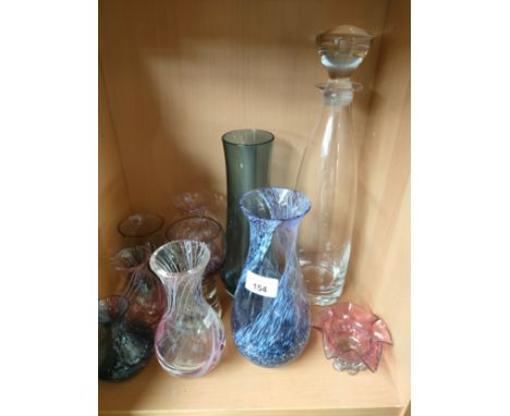 A shelf of art glass vases to include Caithness 