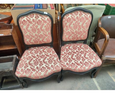 A Pair of French style button back chairs 