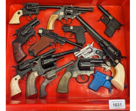 A Collection of vintage children's cap guns; Buntline Special, Lone Star Snubnose, Lone Star Ramrod, Fireball, Crescent Toys 