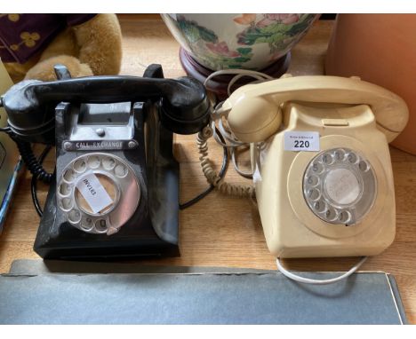 Two vintage bakelite telephones 