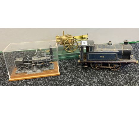 Antique clockwork train loco '112', Displayed Bachmann pewter 'Locomotion 1' model and brass made gatling gun model. 