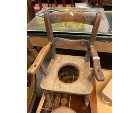 19th century child’s commode Arm chair on turned supports 