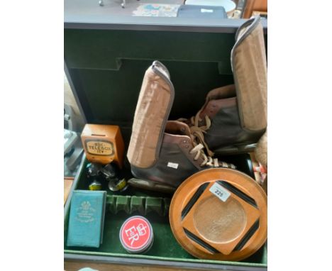 A Case of collectables to include vintage puck master ice skates and old money banks 