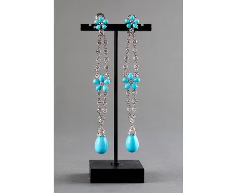 Pair of chandelier earrings in white gold set with diamonds and turquoise with floral motif.L. 11.5 cmGross weight: 29 g