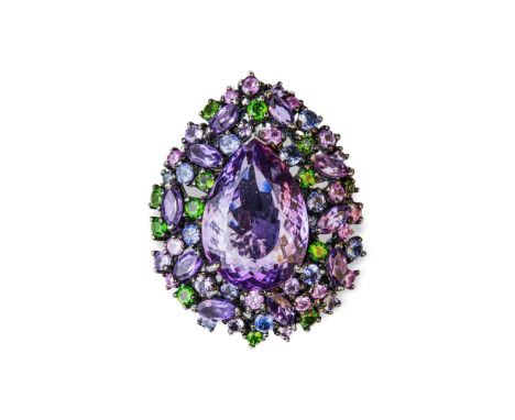 Drop-shaped silver ring centred on a pear-cut amethyst surrounded by coloured sapphires and peridots.Ring size : 55Gross weig