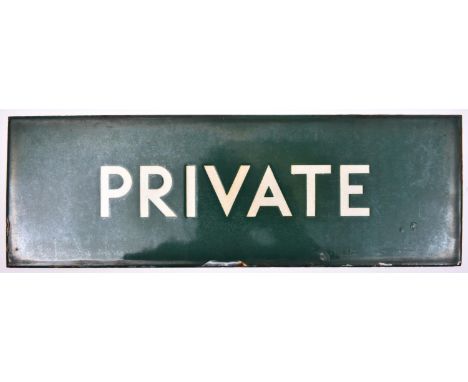 A BR enamelled station sign; PRIVATE. White lettering on green background. Mead McLean &amp; Co. London in red enamel to reve