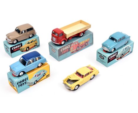 5 Corgi Toys. Aston Martin DB4 in yellow with red interior. Austin Cambridge in light blue. Austin A40 in light blue with a d