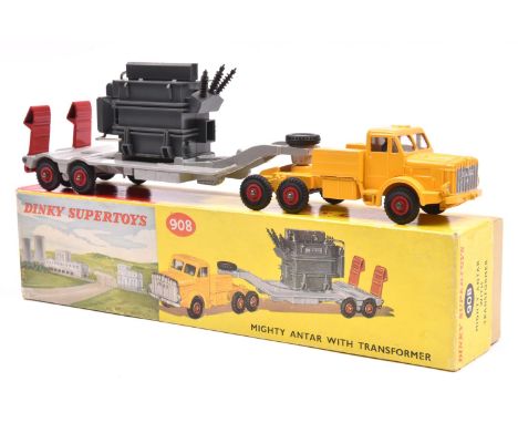 Dinky Supertoys Mighty Antar Transporter with Transformer (908). Yellow tractor unit, with grey flatbed and red wheels and ra