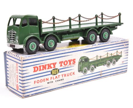Dinky Supertoys Foden FG Flat Truck with Chains (905). Example with dark green cab, chassis and body, and light green wheels.