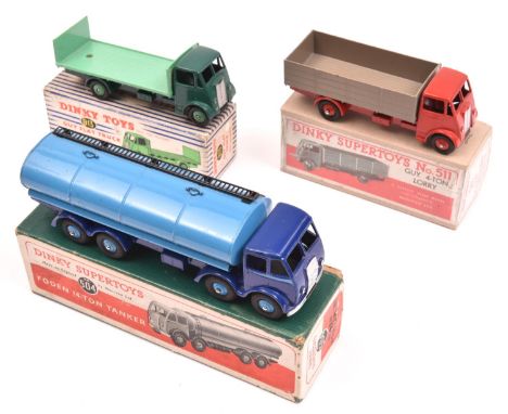 3 Dinky Toys trucks. A Foden DG 14-Ton Tanker (504). Cab and chassis in dark blue with mid blue flash, mid blue tank and whee